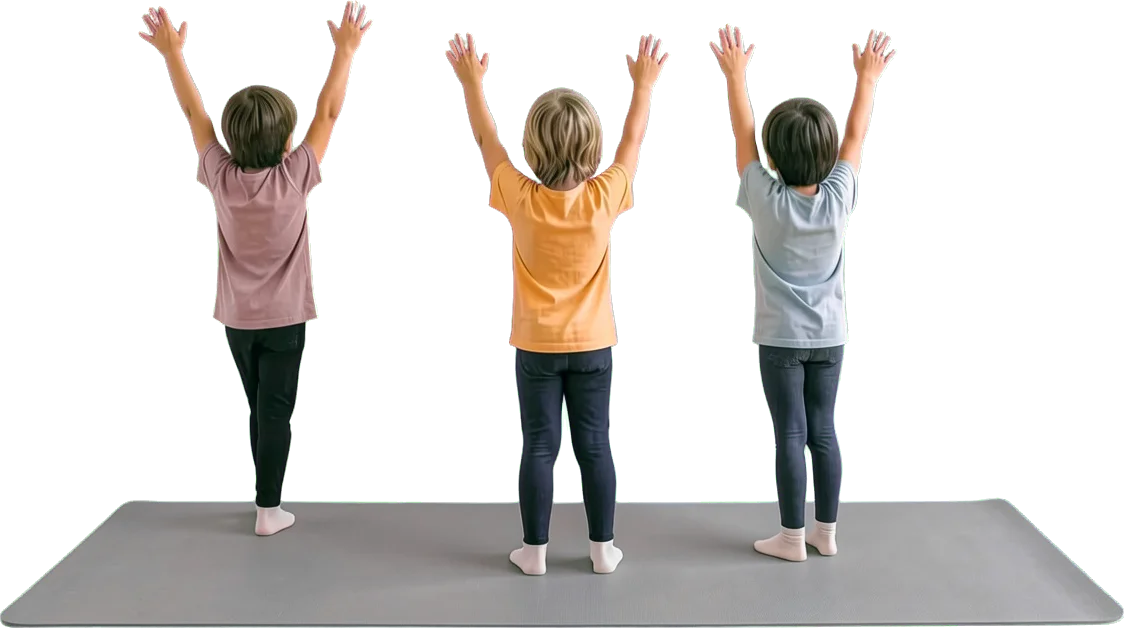Three children from behind with their arms up