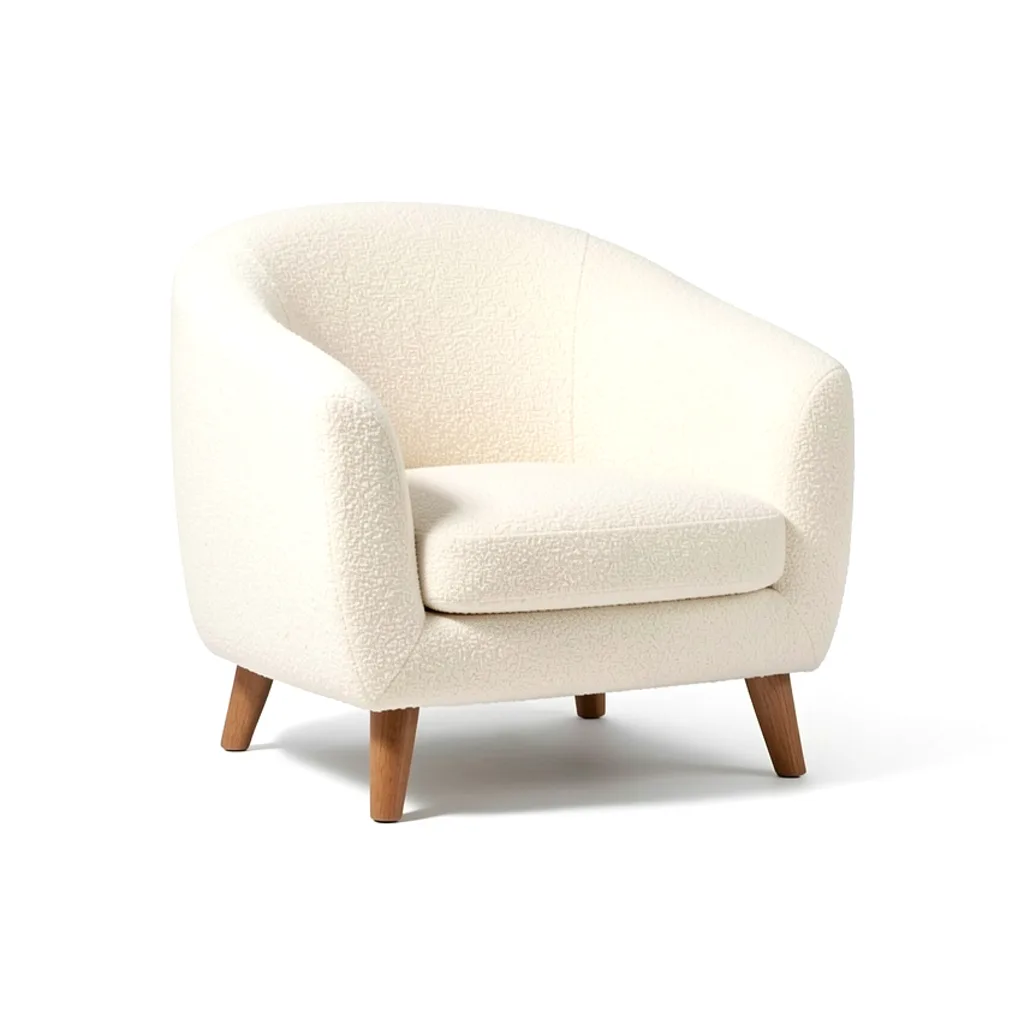 A low lounge chair in ivory bouclé on oak legs