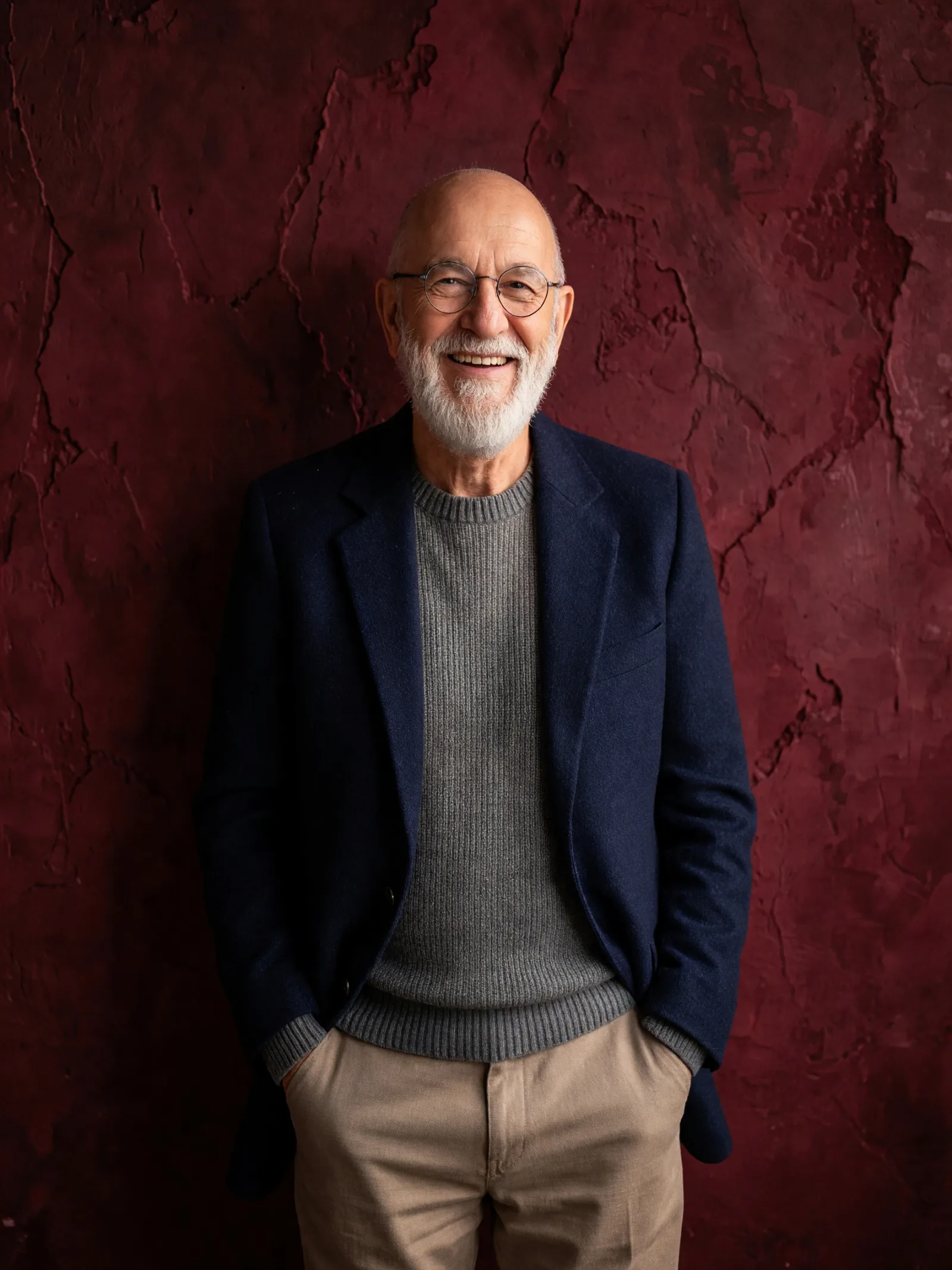 Peter Lindner against a wine-red wall