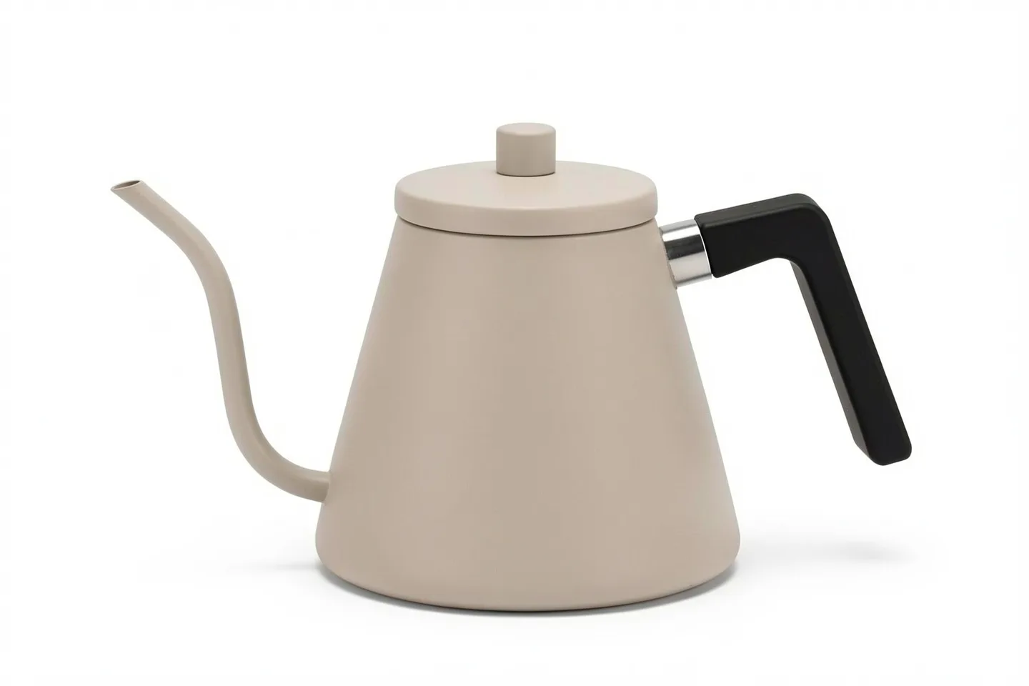 The kettle in stone, with a black handle